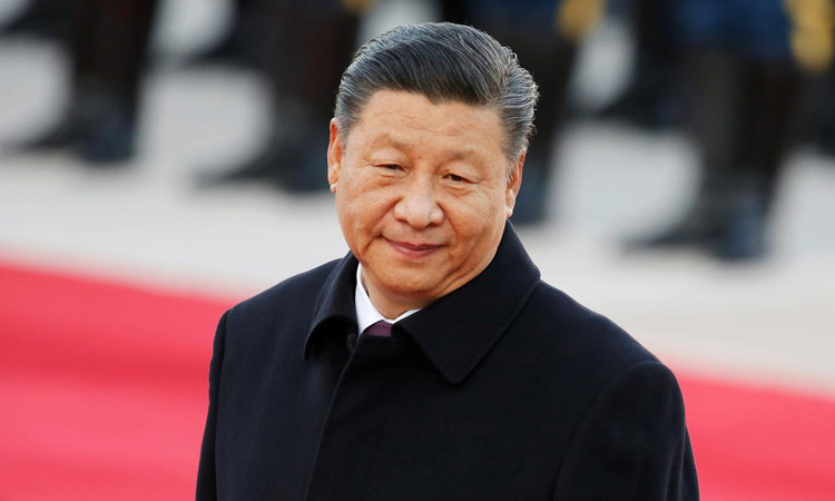 Chủ tịch Trung Quốc Tập Cận Bình bên ngoài Đại lễ đường Nhân dân ở Bắc Kinh hôm 25/10. Ảnh: Reuters.